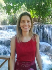 Louise in front of a waterfall